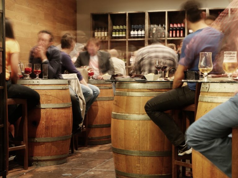 People drinking in a bar in Denia